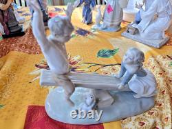 NAO Lladro Spain Bisque Porcelain Boy and Girl on Seesaw with Dog #4867