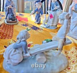 NAO Lladro Spain Bisque Porcelain Boy and Girl on Seesaw with Dog #4867