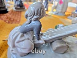 NAO Lladro Spain Bisque Porcelain Boy and Girl on Seesaw with Dog #4867