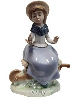 NAO by Lladro Figurine Girl Sitting on Wheelbarrow Excellent Condition