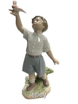 NAO by Lladro Flying Free Porcelain Figurine Boy with Bird 1977