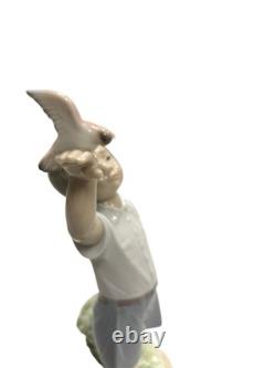 NAO by Lladro Flying Free Porcelain Figurine Boy with Bird 1977
