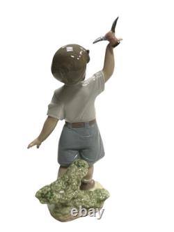 NAO by Lladro Flying Free Porcelain Figurine Boy with Bird 1977