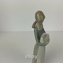 NAO by Lladro Girl A Holding Duck Figure 10.75 in tall