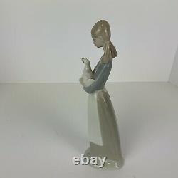 NAO by Lladro Girl A Holding Duck Figure 10.75 in tall