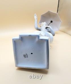 NAO by Lladro Lady with Umbrella Figurine Retired- Mint