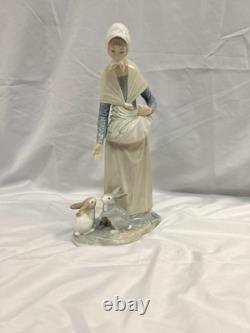 NAO by Lladro Peasant Woman Feeding Two Rabbits Porcelain Figurine #144