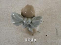 NAO by Lladro Spaniel Puppy With Bow Figure/Figurine 1349 Ornamental Piece G22