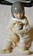 NAO by Lladro, sitting girl Holding cat. 1994 Vintage. Handmade. Spain
