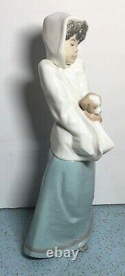 Nao By Lladro 01296- Young Winter Brillo 11-3/4 Tall Black Girl Cradling Puppy