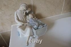 Nao By Lladro 17cm High Asleep Mother With Child In Crib With Teddybear Figurine