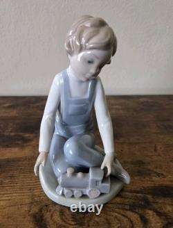 Nao By Lladro Boy With Toy Train Figure Porcelain Spain