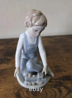 Nao By Lladro Boy With Toy Train Figure Porcelain Spain