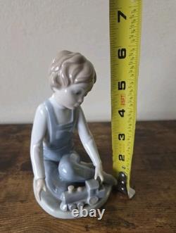 Nao By Lladro Boy With Toy Train Figure Porcelain Spain