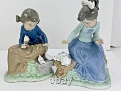 Nao Lladro 2 Figurines Spain Lets rest Doggie on log Ever so gently girl birds
