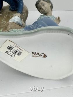 Nao Lladro 2 Figurines Spain Lets rest Doggie on log Ever so gently girl birds