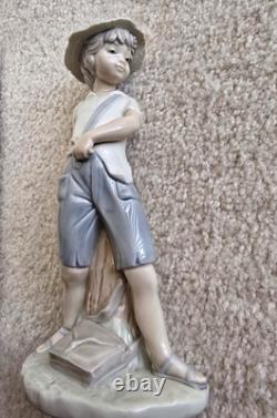 Nao Lladro Boy with Sling Shot