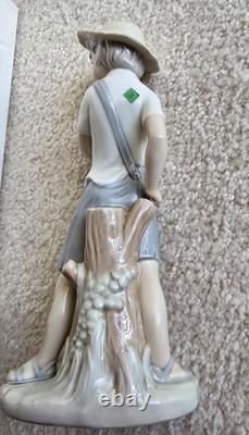 Nao Lladro Boy with Sling Shot