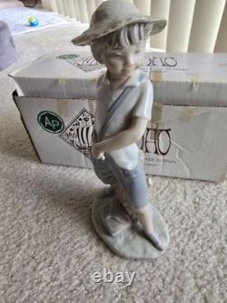 Nao Lladro Boy with Sling Shot