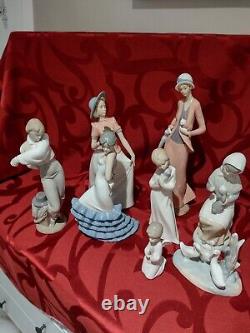 Nao Lladro Pre Owned 8 Figurines. Mint Condition