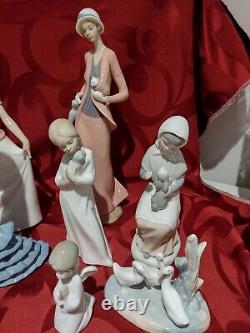 Nao Lladro Pre Owned 8 Figurines. Mint Condition