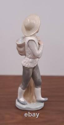Nao Lladro Standing Boy Leaning Against Tree Stump Figurine very rare