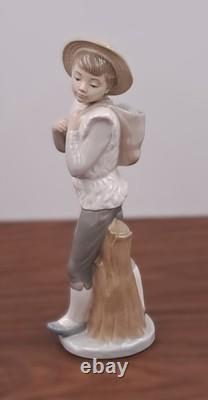 Nao Lladro Standing Boy Leaning Against Tree Stump Figurine very rare