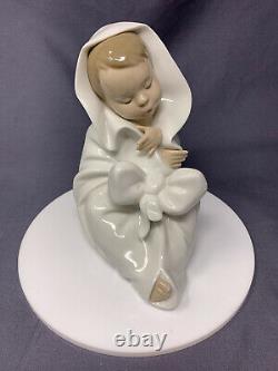 Nao by Lladro Figure, Baby Wrapped in a Blanket,'All Bundled Up' 1340