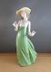 Nao by Lladro Gentle Breeze Figurine (Special Edition) Girl Green Single Flower