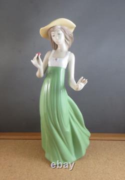 Nao by Lladro Gentle Breeze Figurine (Special Edition) Girl Green Single Flower
