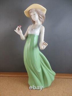 Nao by Lladro Gentle Breeze Figurine (Special Edition) Girl Green Single Flower