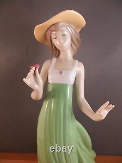 Nao by Lladro Gentle Breeze Figurine (Special Edition) Girl Green Single Flower