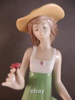 Nao by Lladro Gentle Breeze Figurine (Special Edition) Girl Green Single Flower