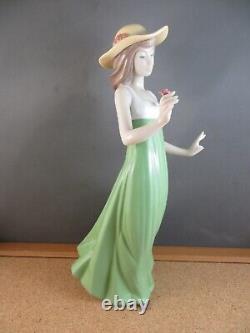 Nao by Lladro Gentle Breeze Figurine (Special Edition) Girl Green Single Flower