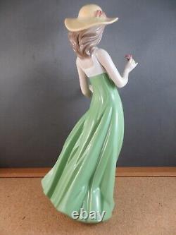 Nao by Lladro Gentle Breeze Figurine (Special Edition) Girl Green Single Flower