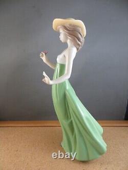 Nao by Lladro Gentle Breeze Figurine (Special Edition) Girl Green Single Flower