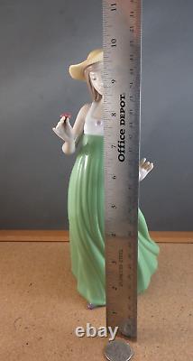 Nao by Lladro Gentle Breeze Figurine (Special Edition) Girl Green Single Flower