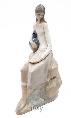 Nao by Lladro Girl Sitting On the Rock With Jug 24.2 cm (9.5) Porcelain Figure