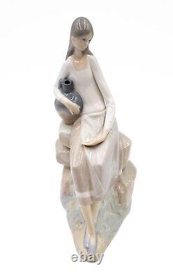 Nao by Lladro Girl Sitting On the Rock With Jug 24.2 cm (9.5) Porcelain Figure