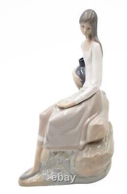 Nao by Lladro Girl Sitting On the Rock With Jug 24.2 cm (9.5) Porcelain Figure