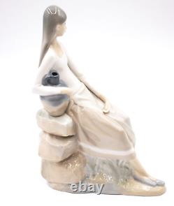 Nao by Lladro Girl Sitting On the Rock With Jug 24.2 cm (9.5) Porcelain Figure