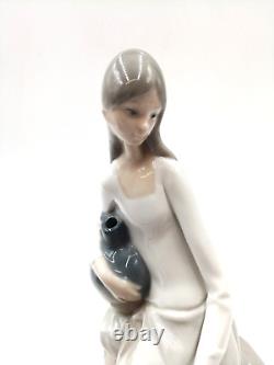 Nao by Lladro Girl Sitting On the Rock With Jug 24.2 cm (9.5) Porcelain Figure
