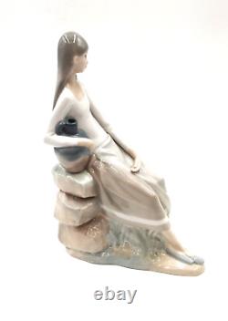 Nao by Lladro Girl Sitting On the Rock With Jug 24.2 cm (9.5) Porcelain Figure