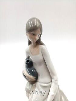 Nao by Lladro Girl Sitting On the Rock With Jug 24.2 cm (9.5) Porcelain Figure