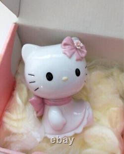 Nao by Lladro Hello Kitty Sitting Down Pink ribbon Doll Figure