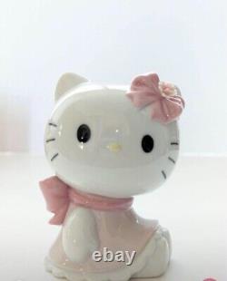 Nao by Lladro Hello Kitty Sitting Down Pink ribbon Doll Figure