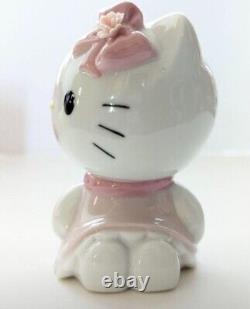 Nao by Lladro Hello Kitty Sitting Down Pink ribbon Doll Figure