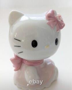 Nao by Lladro Hello Kitty Sitting Down Pink ribbon Doll Figure