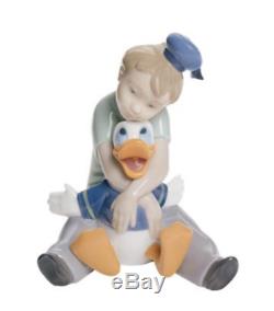 Nao by Lladro Porcelain Disney Daydreaming With Donald Figurine 12cm 02001642