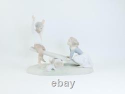 Nao by Lladro Porcelain Figurine Children, Dog on Seesaw, Matte Finish